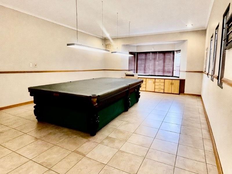 Exceptional lifestyle home with tennis court, entertainment wing, pool, and flatlet - Photo 6