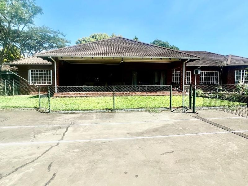 Exceptional lifestyle home with tennis court, entertainment wing, pool, and flatlet - Photo 2