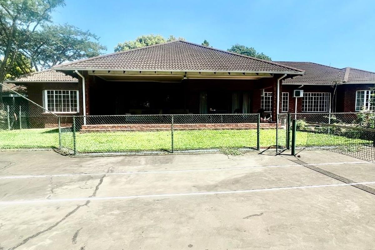 Exceptional lifestyle home with tennis court, entertainment wing, pool, and flatlet - Photo 2