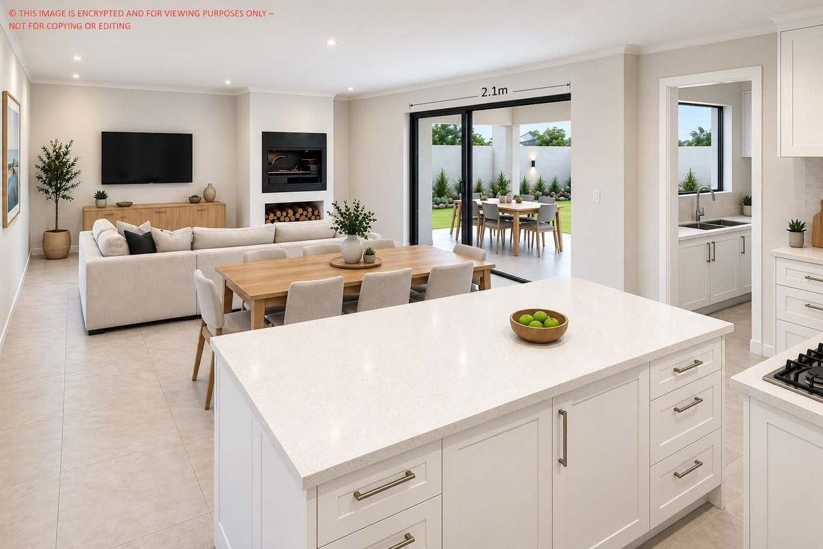Spacious open-plan living area featuring a modern kitchen with stone island, fireplace, and seamless flow to the outdoor patio through sliding glass doors.
