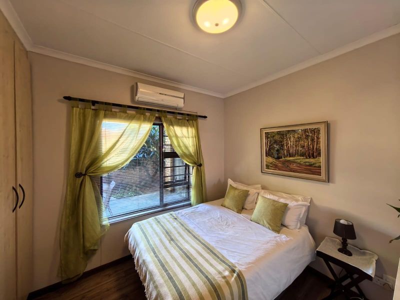 Modern Ease and Suburban Serenity: Your FULL TITLE Secure "Lock-Up-and-Go" Sanctuary - Photo 9