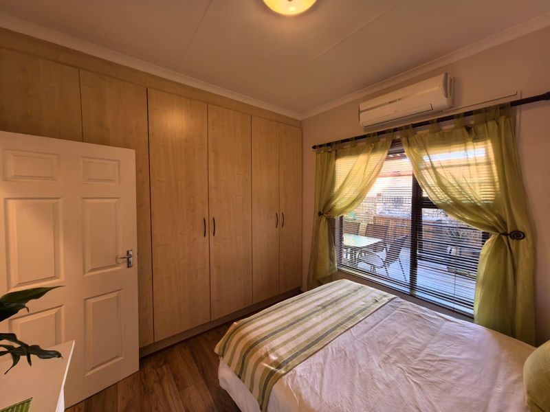 Modern Ease and Suburban Serenity: Your FULL TITLE Secure "Lock-Up-and-Go" Sanctuary - Photo 10