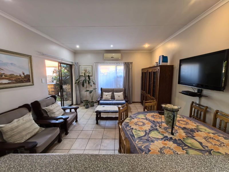 Modern Ease and Suburban Serenity: Your FULL TITLE Secure "Lock-Up-and-Go" Sanctuary - Photo 3