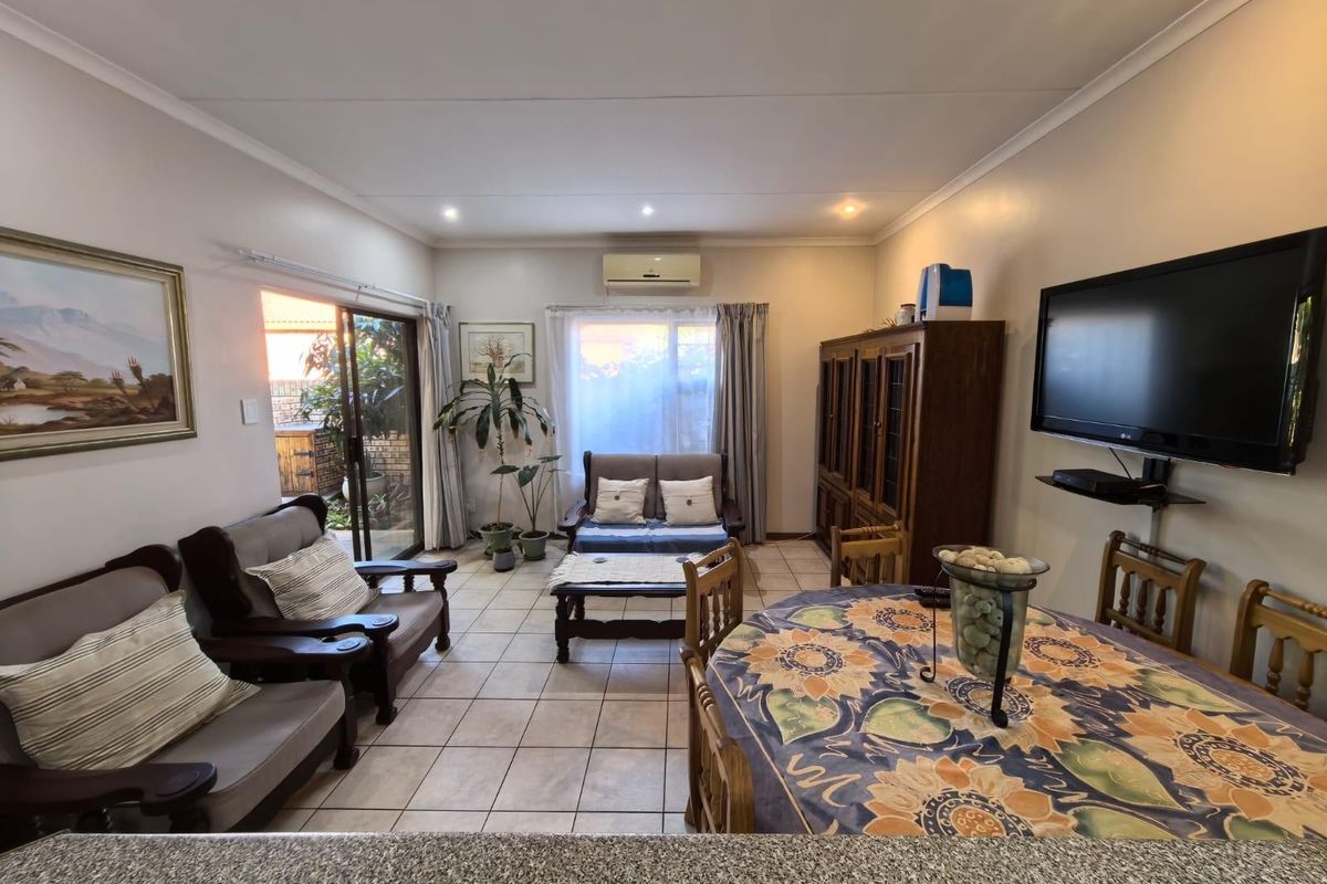 Modern Ease and Suburban Serenity: Your FULL TITLE Secure "Lock-Up-and-Go" Sanctuary - Photo 3