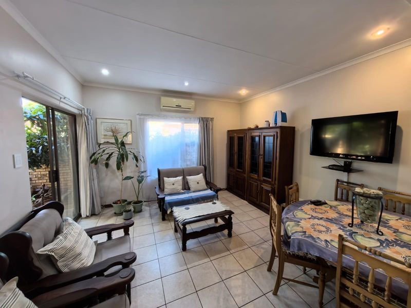 Modern Ease and Suburban Serenity: Your FULL TITLE Secure "Lock-Up-and-Go" Sanctuary - Photo 2