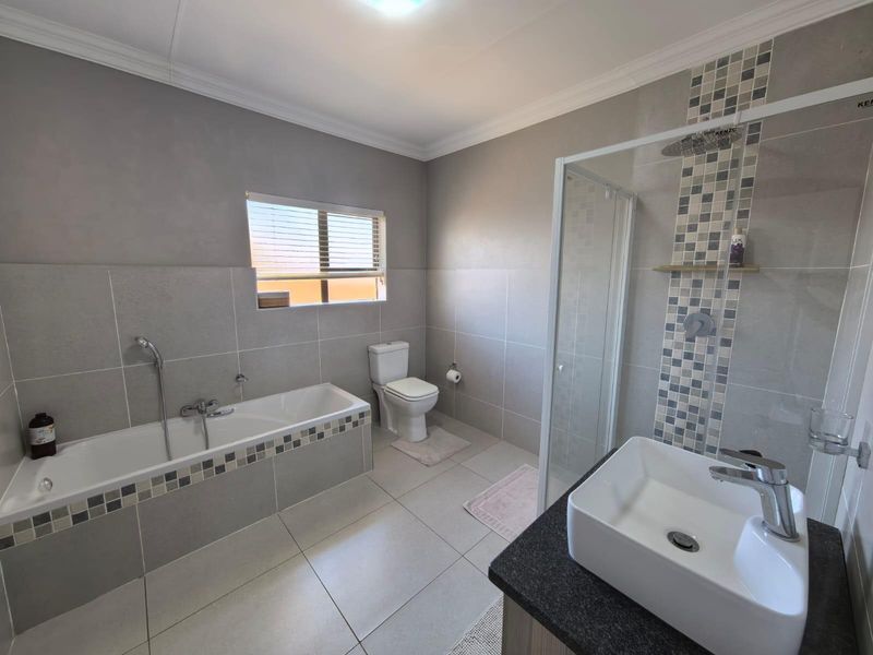 Contemporary Executive Living: Your Secure Full-Title "Lock-Up-and-Go" Sanctuary in Hillcrest - Photo 9