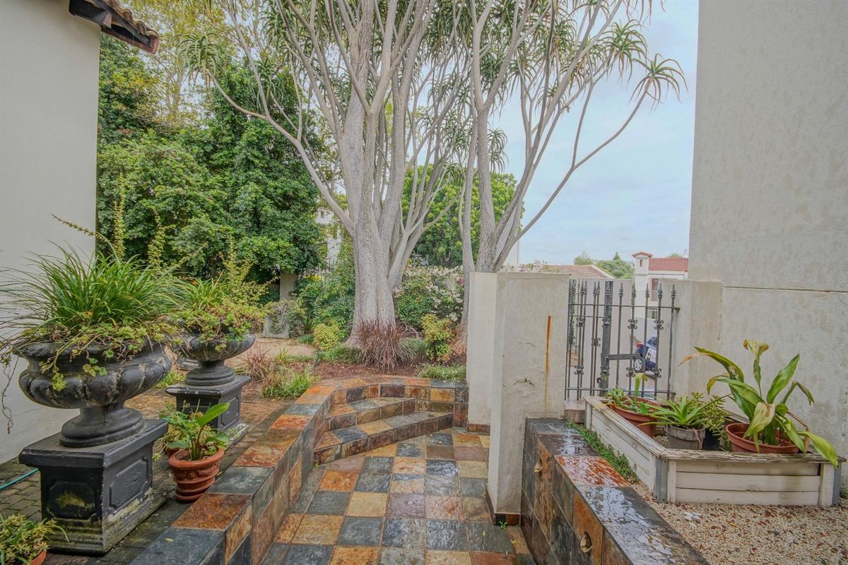 Timeless Elegance in a Secure and Private Estate - Photo 2