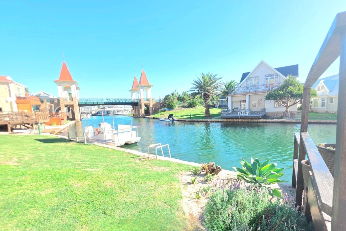 Waterfront Canal Home with Boat Access |  Airbnb Income | Prime Investment Property | Jeffreys Bay - Photo 3
