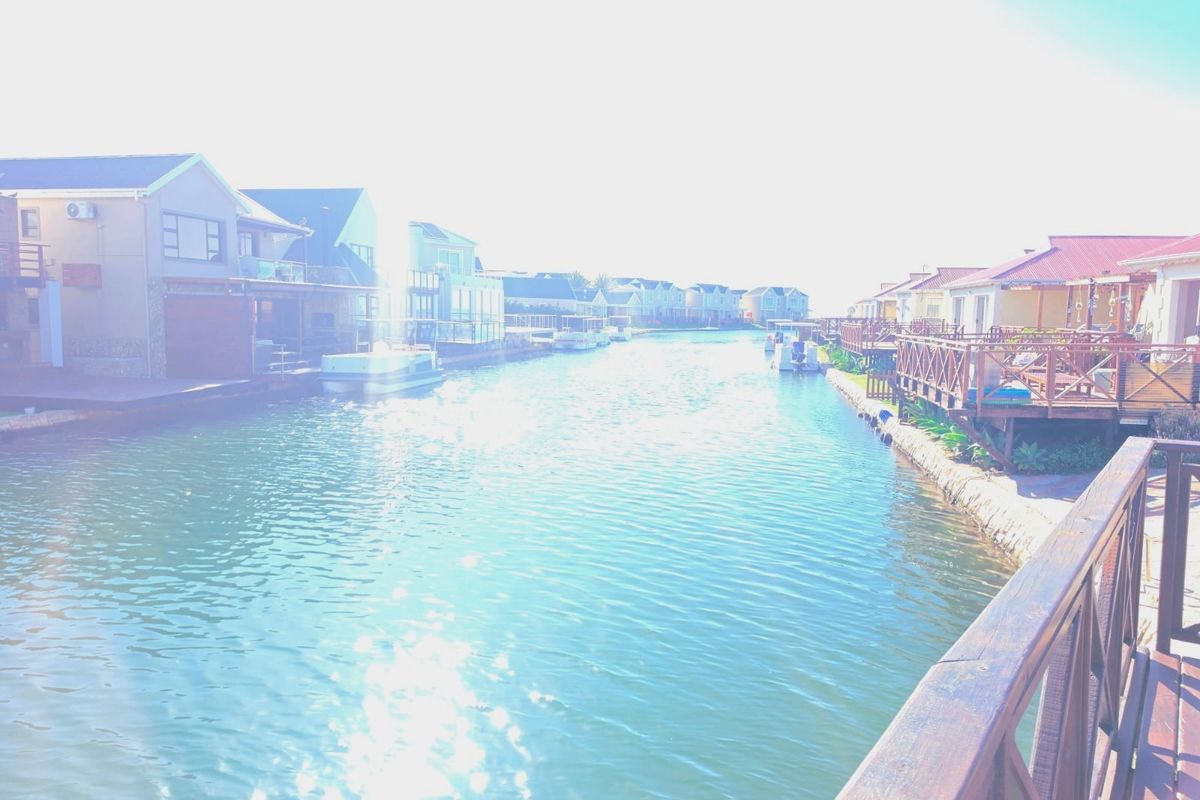 Waterfront Canal Home with Boat Access |  Airbnb Income | Prime Investment Property | Jeffreys Bay - Photo 4