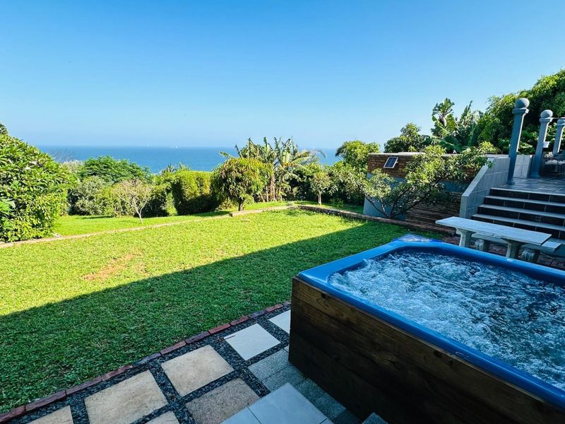 Luxury Coastal Family Home with Spectacular 180° Breaker Sea Views! - Photo 2