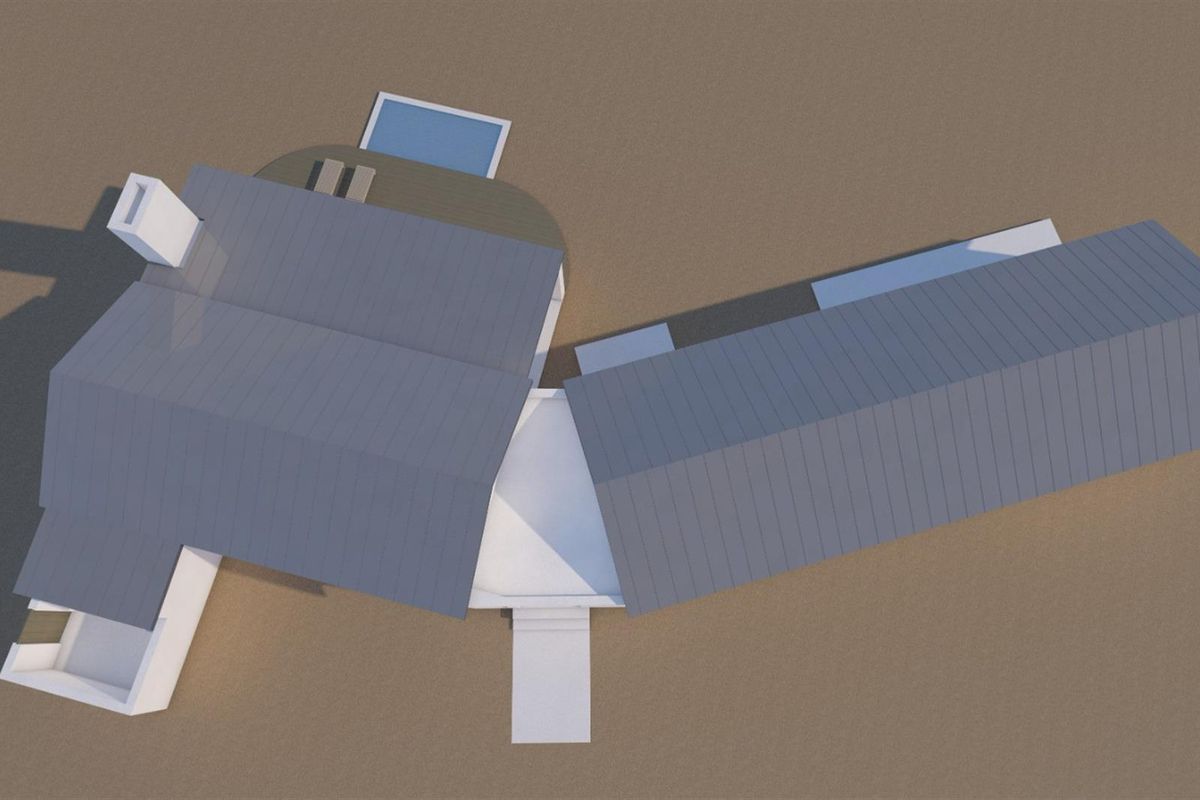 An aerial view of the property layout, showcasing the pitched roof design, chimney, and outdoor swimming pool area.