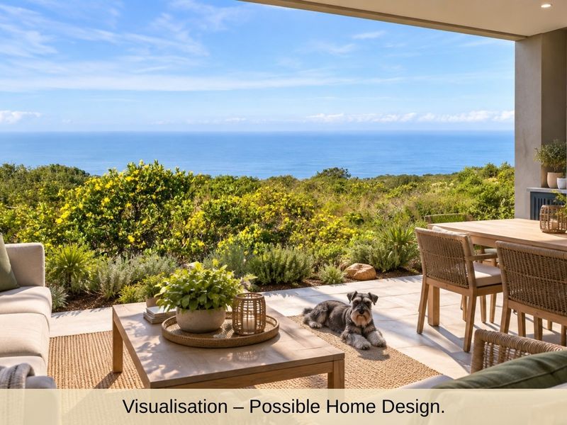 A spacious covered patio featuring a built-in braai and stone paving, offering expansive ocean and coastal landscape views.