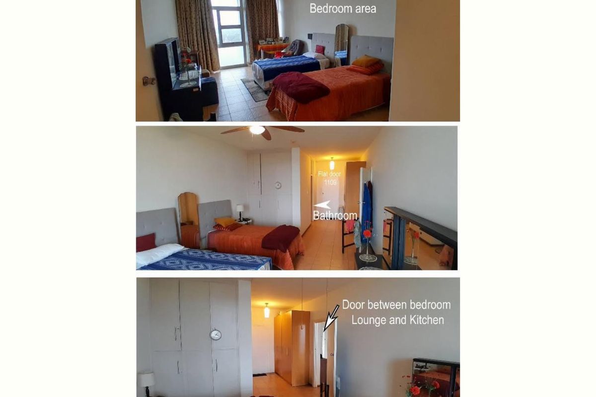 A bedroom area featuring built-in cupboards, tiled flooring, and a ceiling fan, with direct access to a bathroom and adjacent living space.