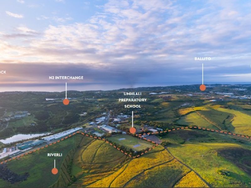 Aerial view of the agricultural land highlighting proximity to local schools, major transport interchanges, and surrounding coastal towns.