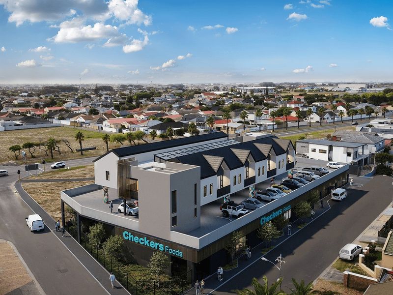 Aerial view of a modern commercial building featuring a Checkers Foods store, rooftop parking, and contemporary architectural design in a suburban setting.
