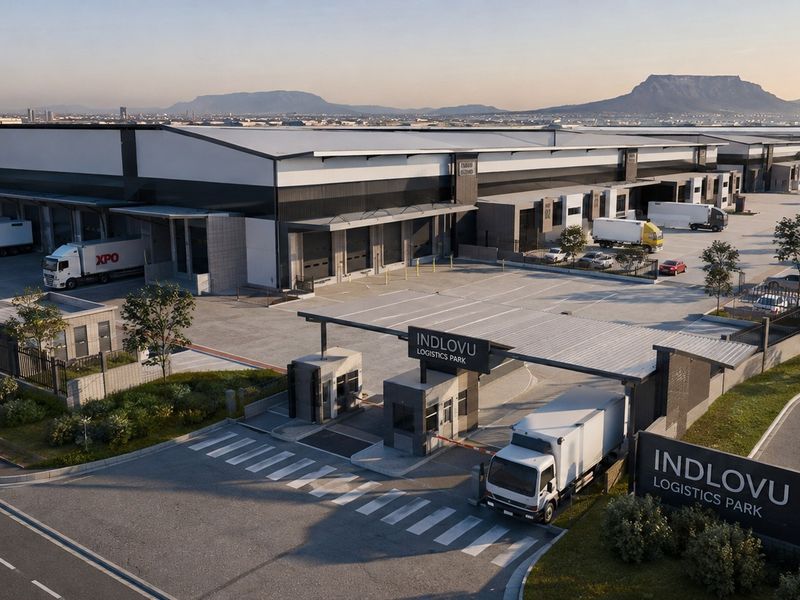Aerial view of Indlovu Logistics Park featuring extensive warehouse facilities, multiple loading docks, secure gated entrance, and paved industrial yard space.