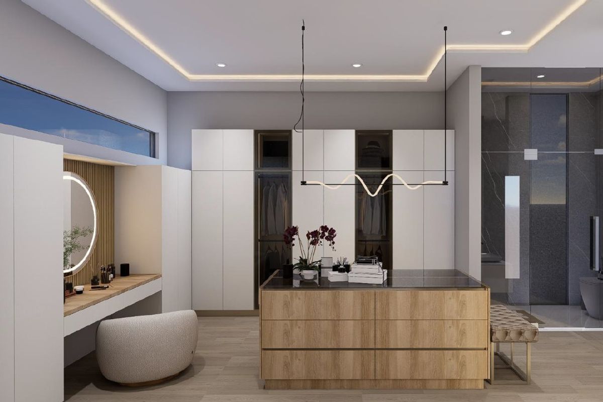 Modern primary bedroom suite featuring extensive built-in cabinetry, a central storage island, integrated vanity, and a sleek glass-enclosed ensuite bathroom.