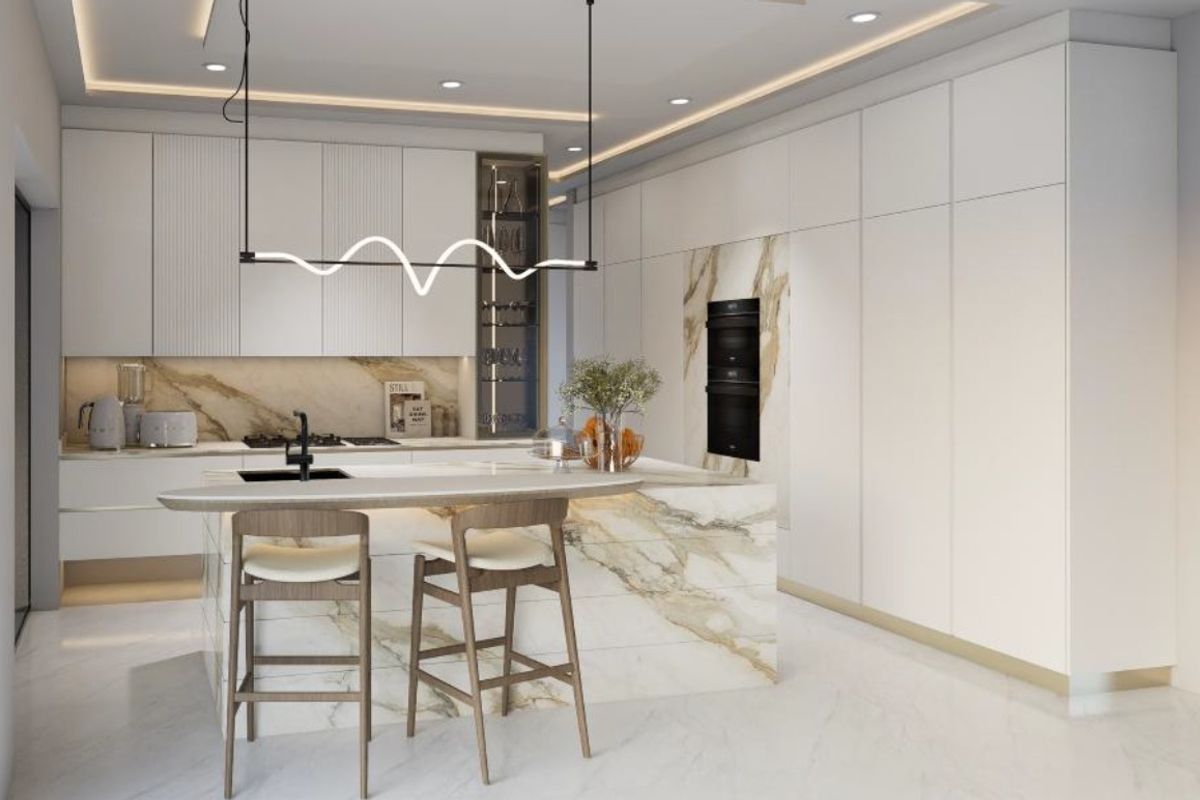Modern luxury kitchen featuring high-end marble island, integrated cabinetry, built-in double ovens, and sophisticated recessed lighting.