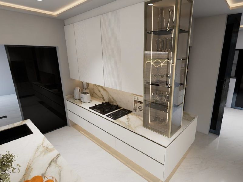 Modern kitchen featuring marble-look countertops, integrated cabinetry, a glass display unit, and a combination gas and induction cooktop with recessed lighting.