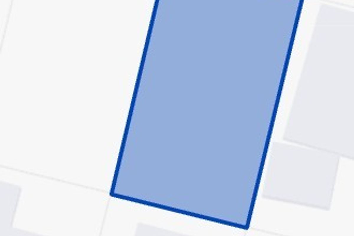 A digital map view highlighting the residential land parcel boundaries.