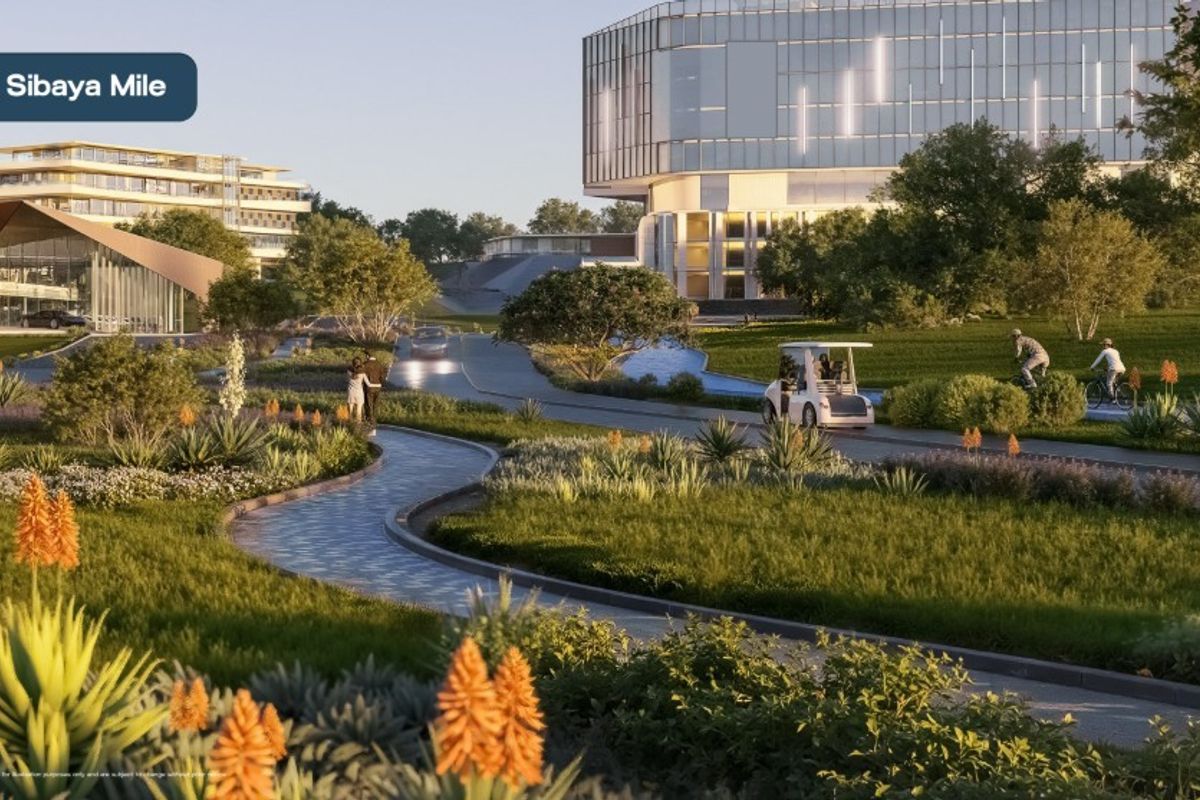 A high-quality architectural rendering of a landscaped residential estate featuring manicured green spaces, paved walking paths, and a modern water feature.