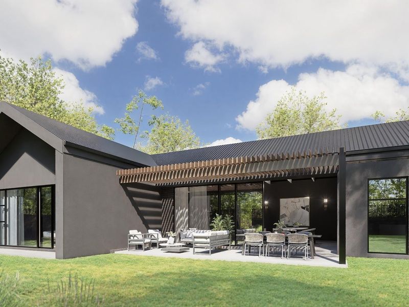Modern rear exterior view featuring a covered patio with a timber pergola, sleek dark facade, and large sliding glass doors opening to the garden.