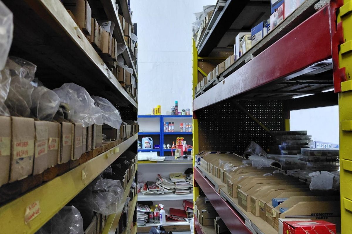 A commercial utility or storage space featuring heavy-duty industrial shelving units for organized inventory management.