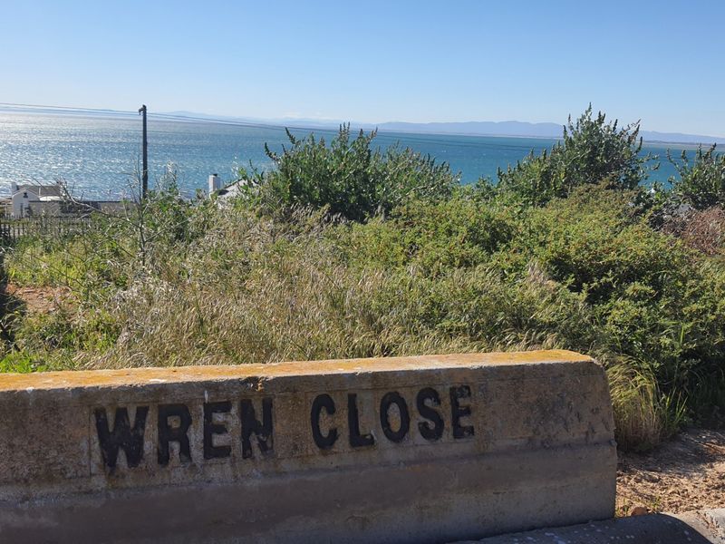 A view of the coastal landscape and ocean from the Wren Close residential area.