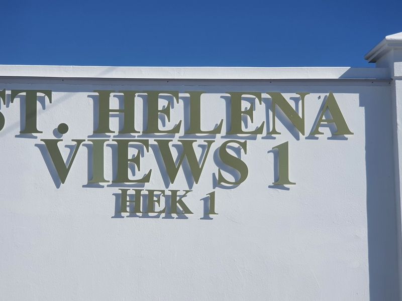 A clear view of the St. Helena Views 1 estate entrance signage mounted on a well-maintained boundary wall.