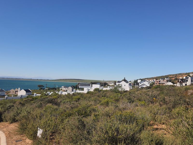 A scenic view overlooking the coastal landscape and surrounding residential development.
