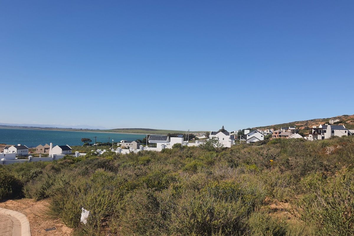 A scenic view overlooking the coastal landscape and surrounding residential development.
