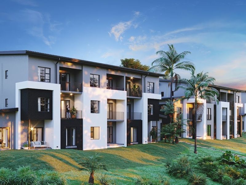 A modern apartment complex featuring contemporary architectural design, private balconies, and well-maintained landscaped surroundings.