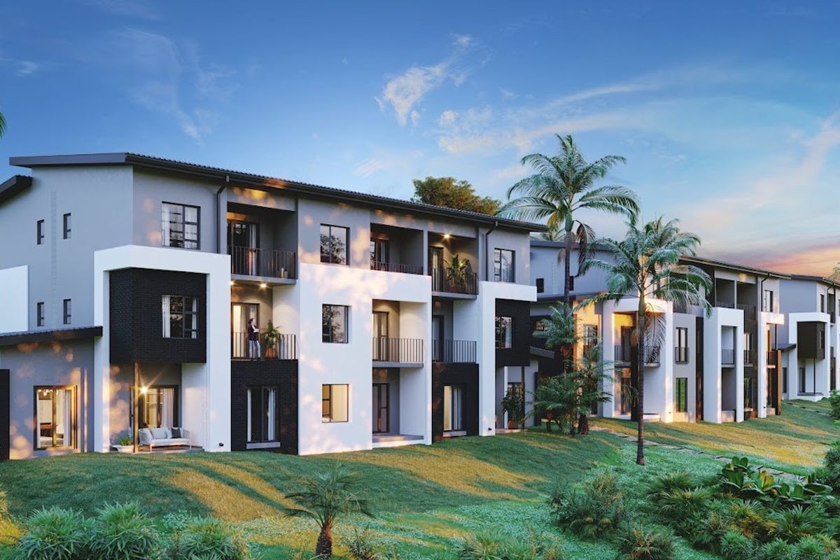 A modern apartment complex featuring contemporary architectural design, private balconies, and well-maintained landscaped surroundings.