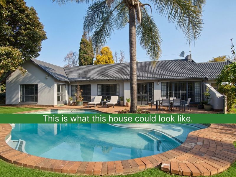 Rear view of the house featuring a swimming pool, brick paved patio area, and well-maintained exterior finishes with security bars on windows.