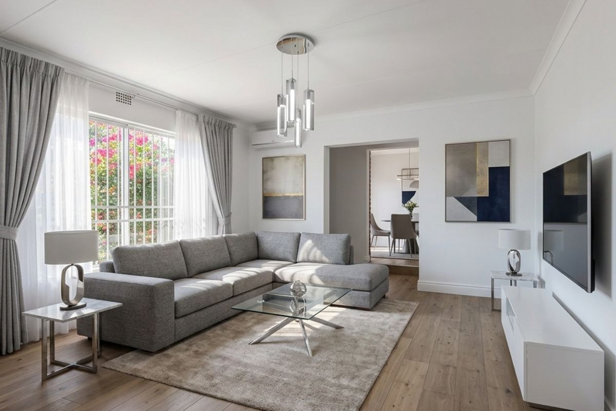 A bright and modern living room featuring laminate flooring, a wall-mounted air conditioning unit, and large windows allowing for natural light.