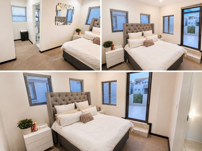 A well-maintained bedroom featuring carpeted floors, venetian blinds, an en-suite bathroom, and direct access to a private balcony.