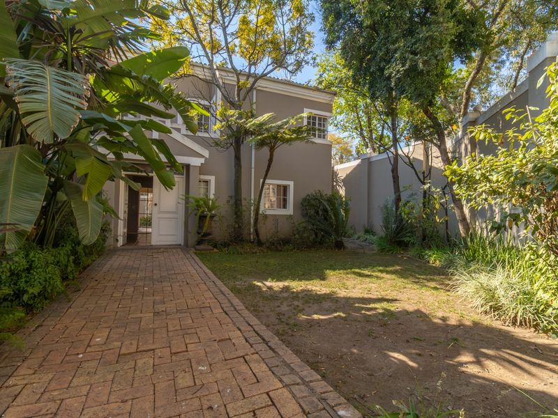 Immaculate 4 Bedroom Family Home with Pool, Backup Power And Water in Secure Woodmead Estate - Photo 2
