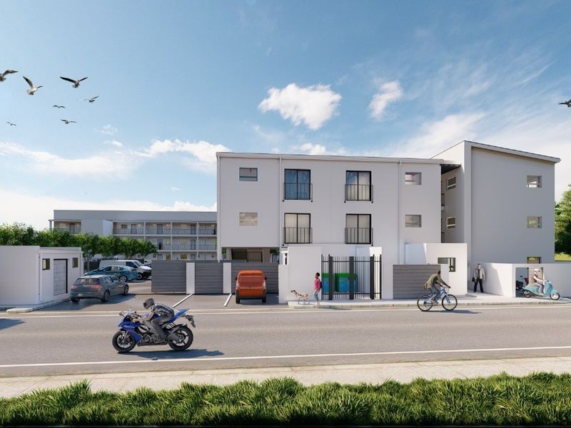 A modern multi-story residential building exterior featuring a gated entrance, paved parking area, and clean architectural lines.