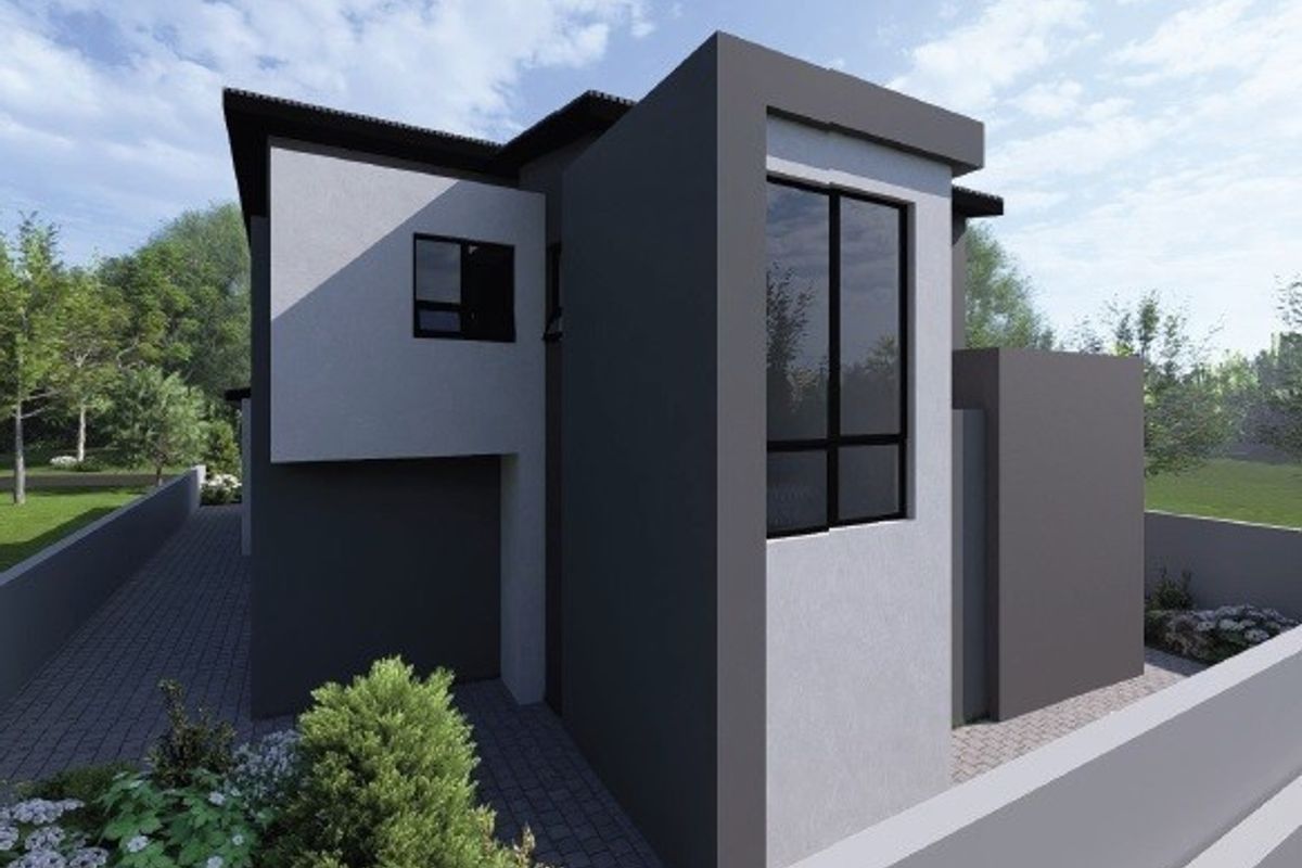 A modern two-story residential property featuring a contemporary facade with clean lines, paved driveway, and secure boundary walling.
