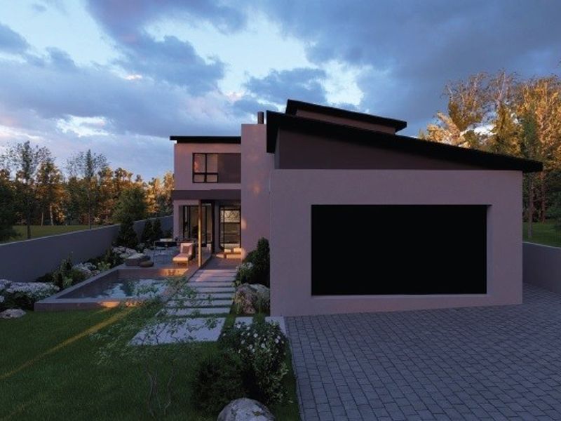 A modern architectural exterior view of a contemporary house featuring a paved driveway, landscaped garden, and clean structural lines.