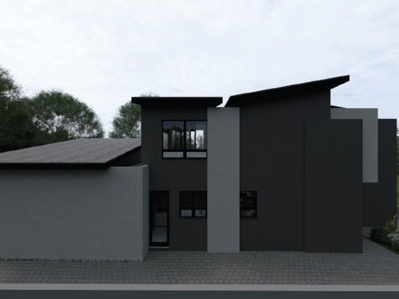 A modern architectural exterior view of a contemporary house featuring a dark facade, paved driveway, and clean geometric lines.