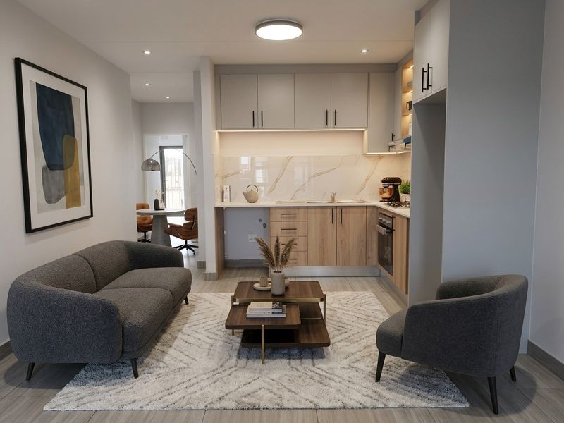 Modern open-plan living area featuring a contemporary kitchen with marble-look splashback, integrated appliances, and sleek cabinetry, seamlessly flowing into the lounge space.