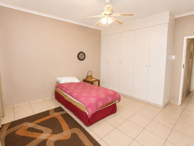 Versatile Family Home with Separate Cottage, Exceptional Parking and Multiple Living Zones - Photo 9