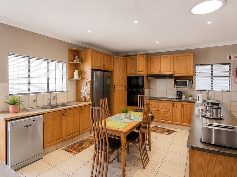 Versatile Family Home with Separate Cottage, Exceptional Parking and Multiple Living Zones - Photo 6