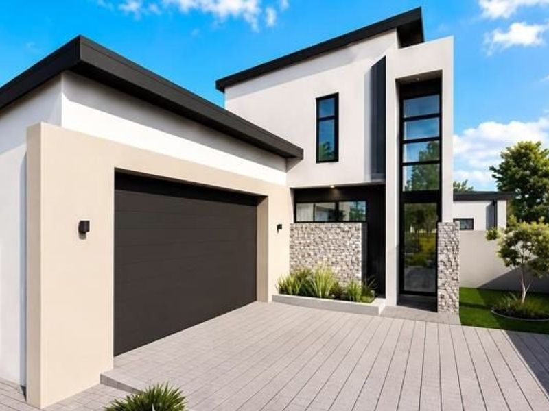 Modern architectural front elevation featuring a double garage, stone cladding accents, and clean lines with a paved driveway.