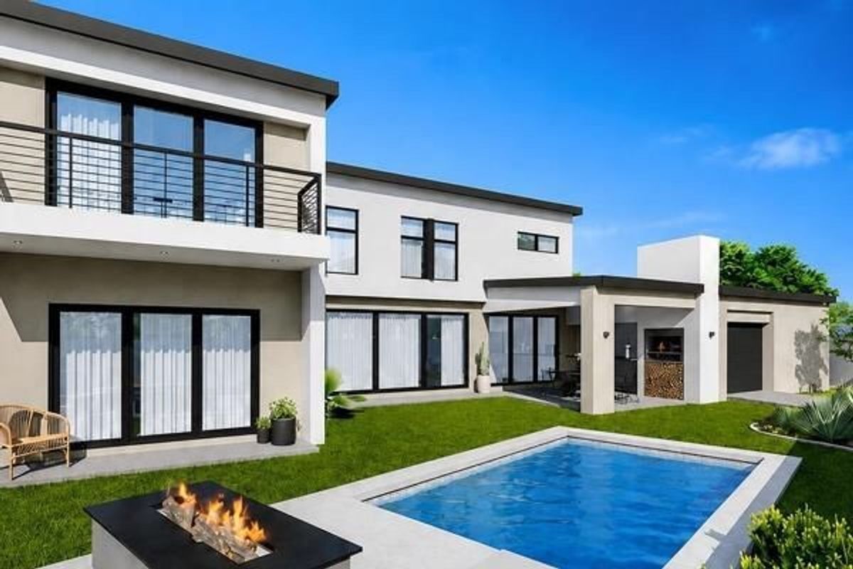 Modern double-storey rear elevation featuring a swimming pool, paved patio area, built-in braai, and a balcony overlooking the landscaped garden.