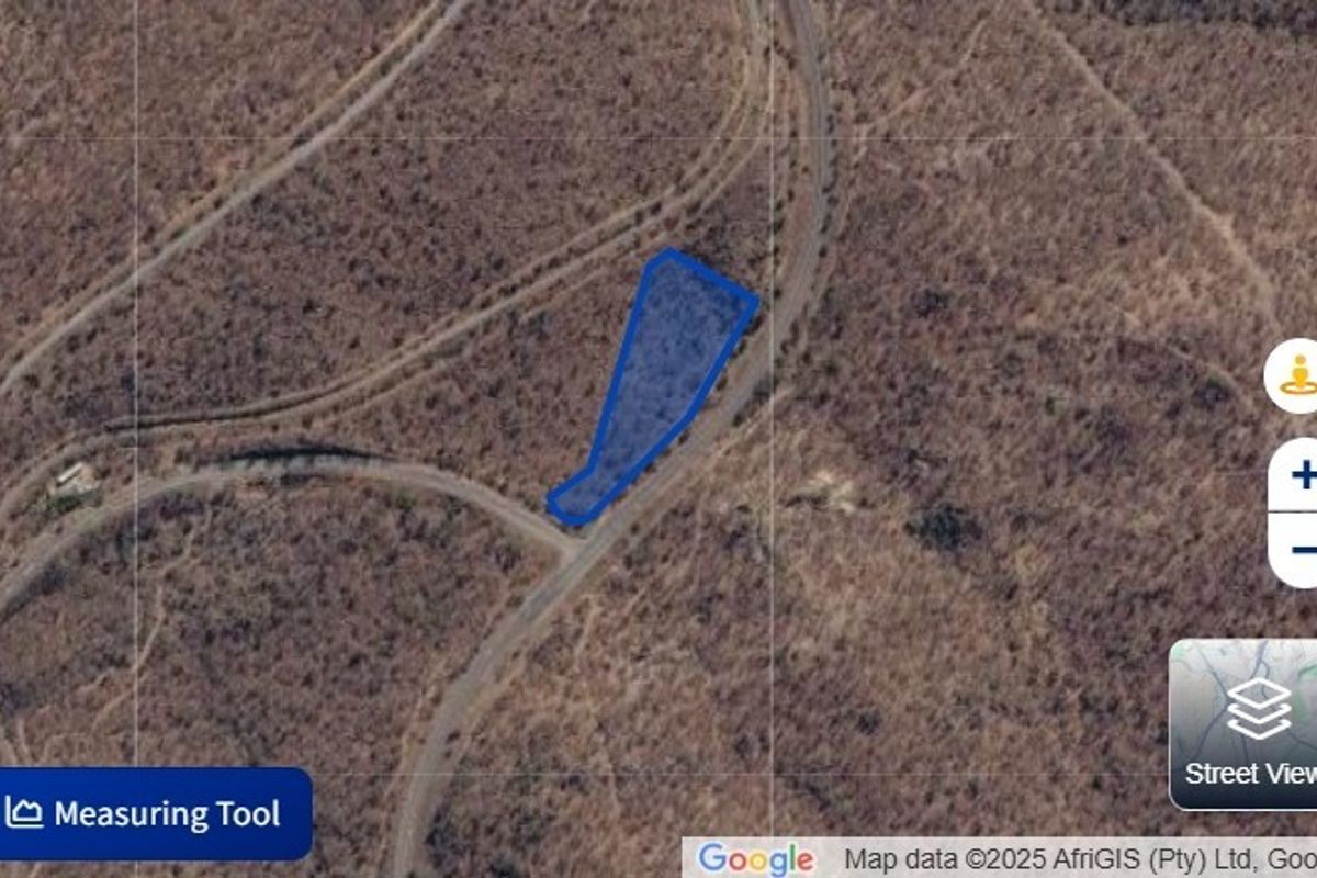 An aerial satellite view showing the boundaries of the vacant residential land plot.