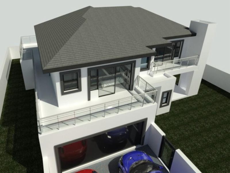 Aerial view of a modern two-story residential property featuring a tiled roof, multiple balconies with stainless steel balustrades, and a double garage.