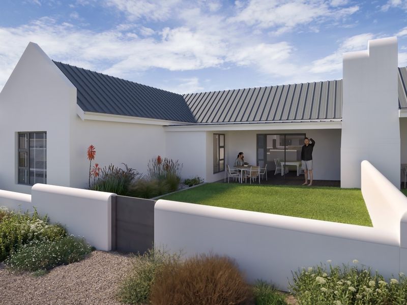 A modern rear exterior view featuring a covered patio, manicured lawn, and clean white architectural lines with a durable metal roof.