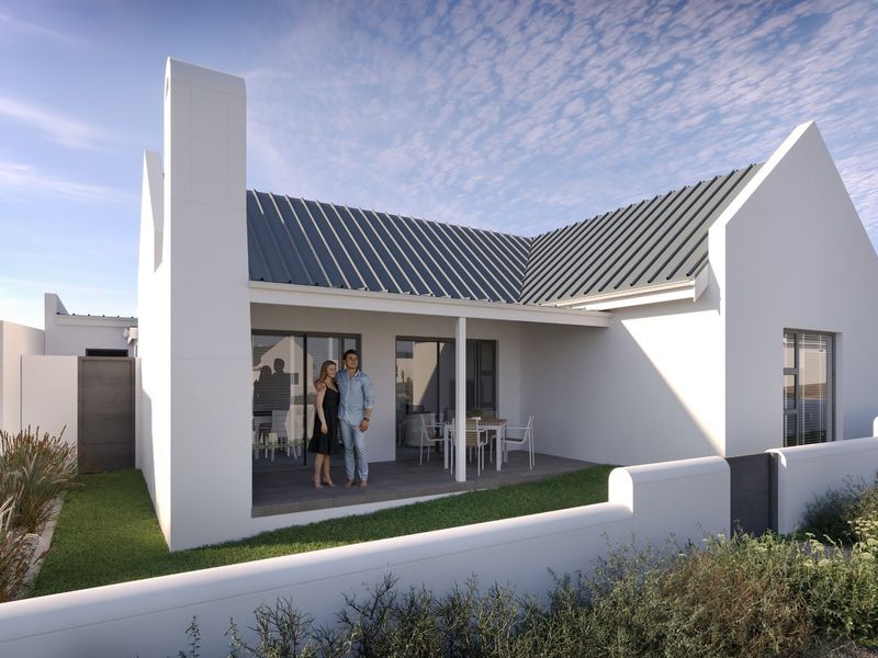 A modern rear exterior view of a house featuring a covered patio, metal roofing, and a clean white facade with a surrounding boundary wall.